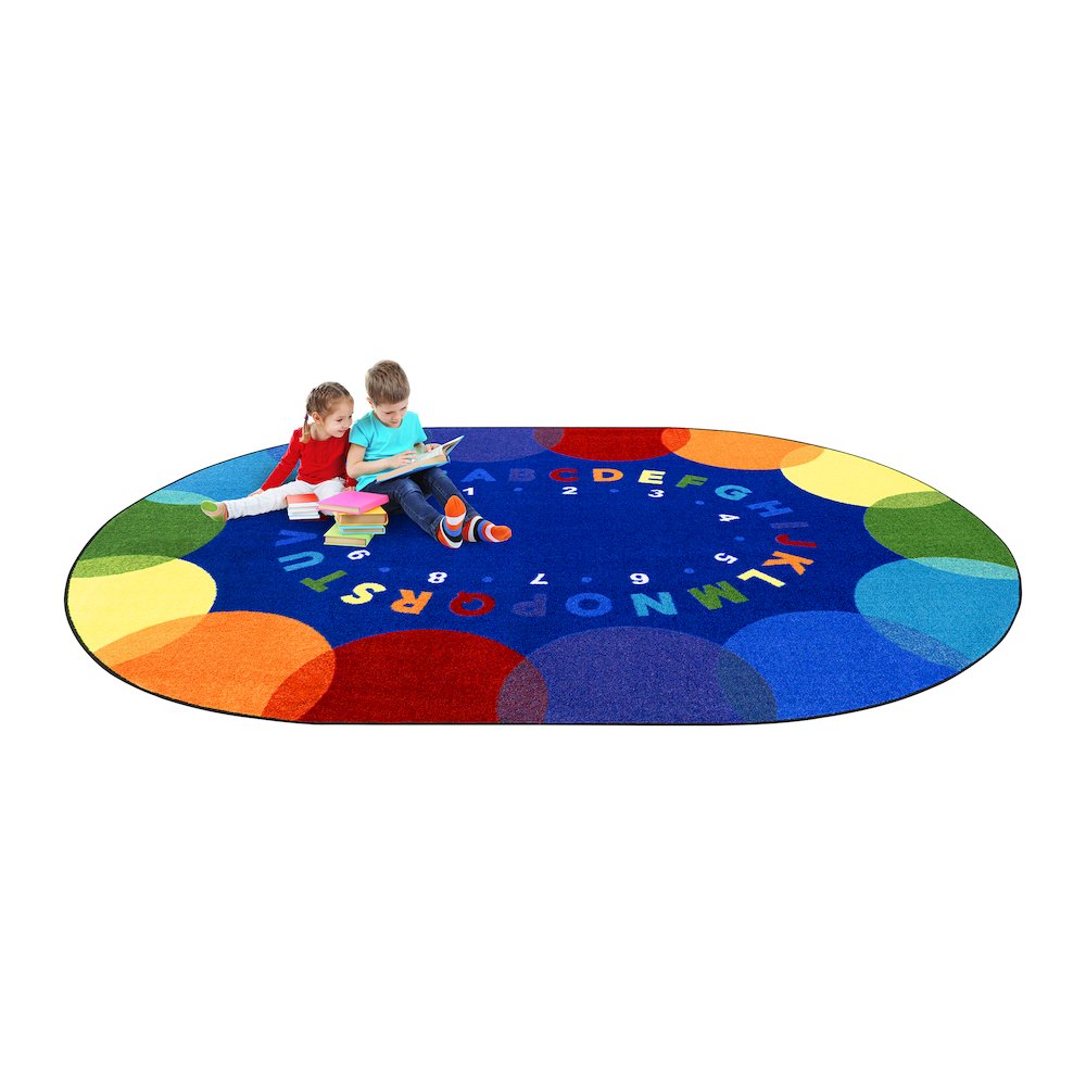 Take A Seat 10'9" x 13'2" Oval Area Rug in Color Multi