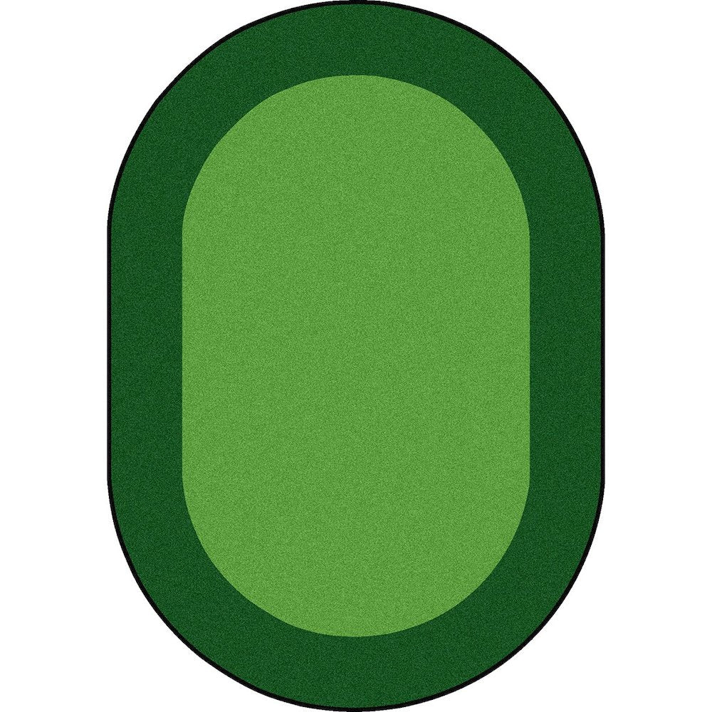 Kid Essentials All Around 7'8" x 10'9" Oval Area Rug in Color Green