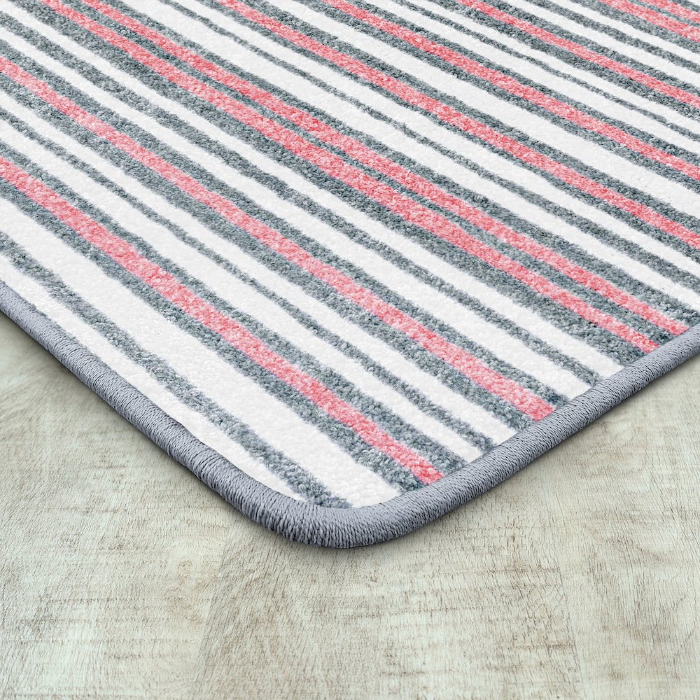 Claremont Kids Between the Lines 5'4" x 7'8" Area Rug in Color Blush
