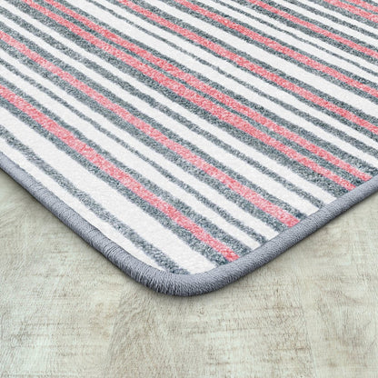 Claremont Kids Between the Lines 5'4" x 7'8" Area Rug in Color Blush