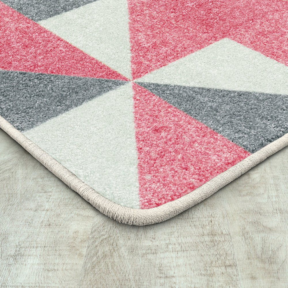 Claremont Kids Cartwheel 5'4" x 7'8" Area Rug in Color Blush