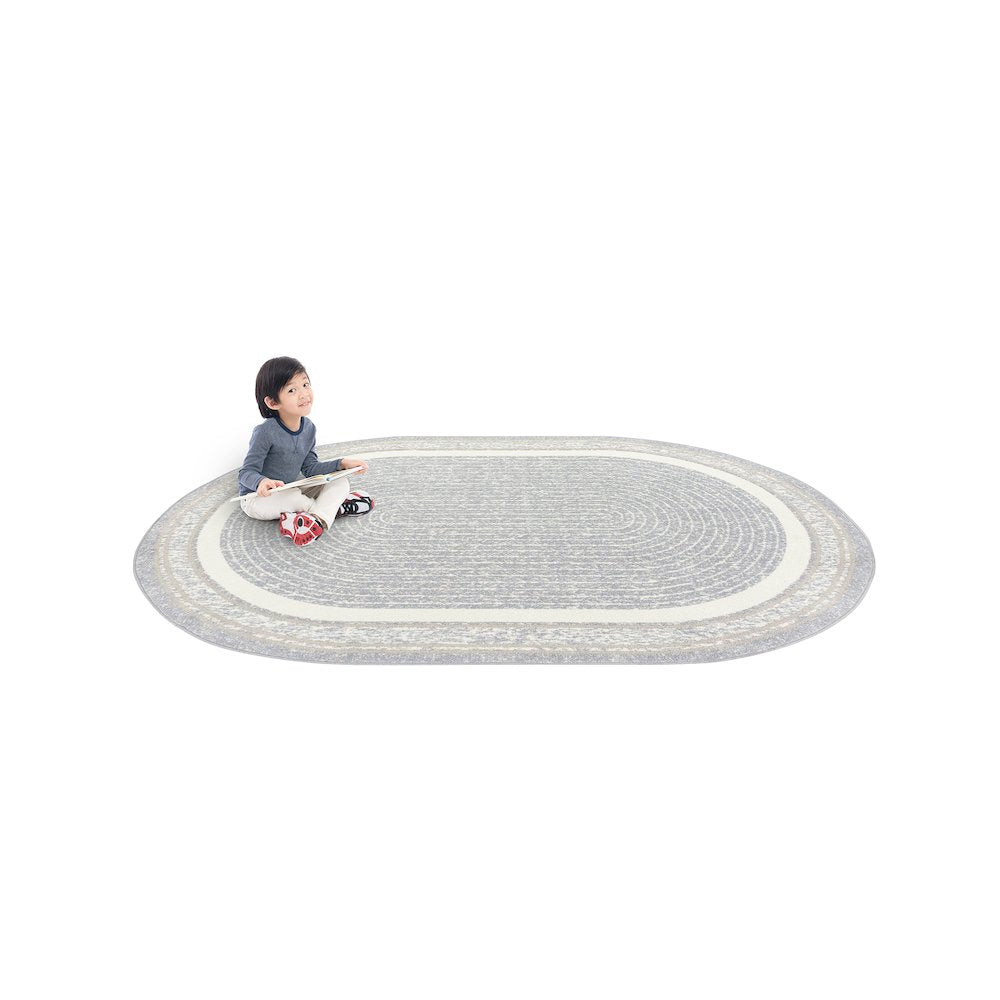 Cozy Corner 5'4" x 7'8" Oval Area Rug in Color Mist