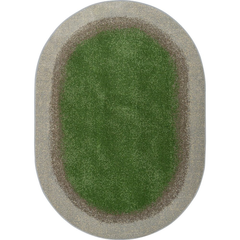 Kid Essentials Grounded 7'8" x 10'9" Oval Area Rug in Color Meadow