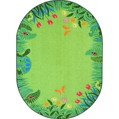 Kid Essentials Merry Meadows 7'8" x 10'9" Oval Area Rug in Color Green