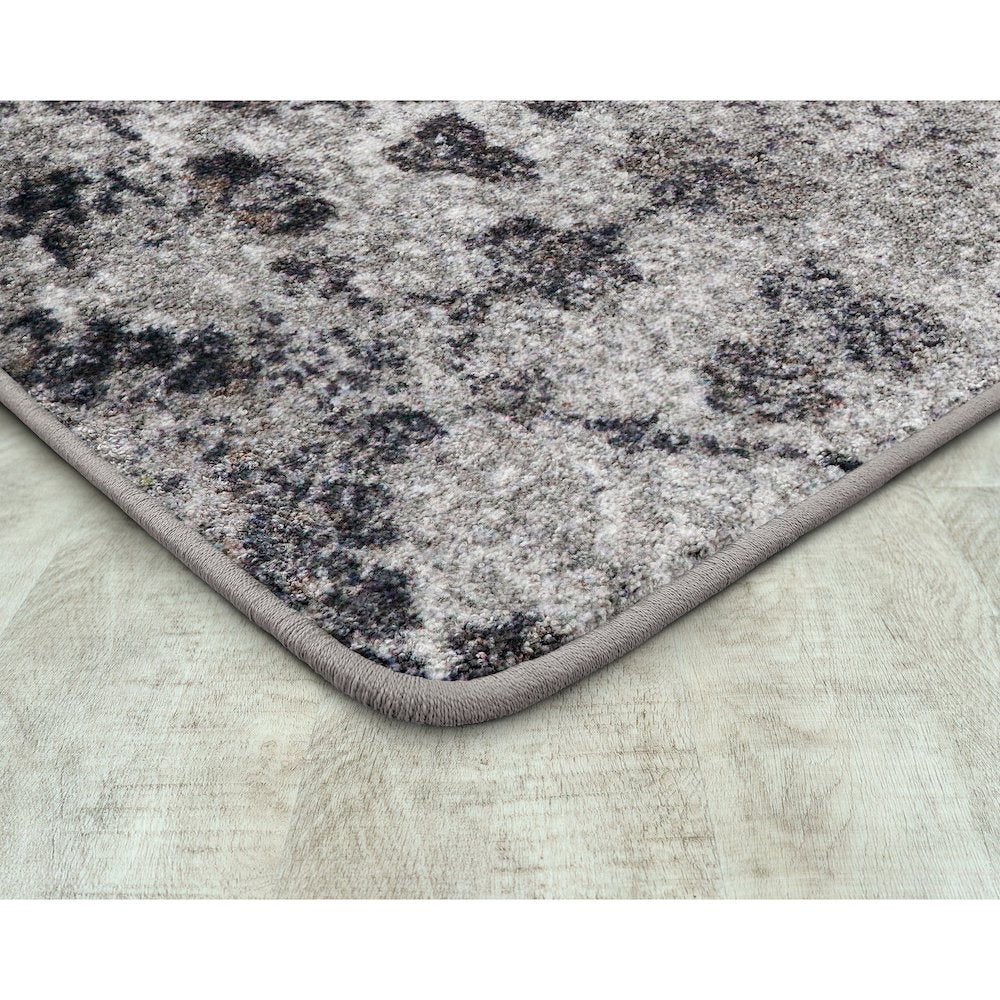 Mojave Bloom 5'4" x 7'8" Area Rug in Color Twilight