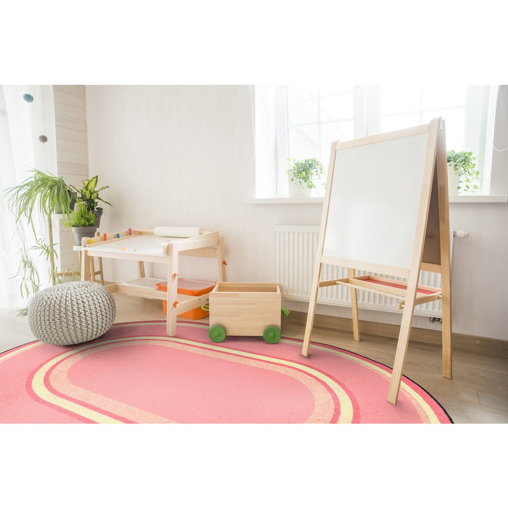 Kid Essentials Ripples 5'4" x 7'8" Oval Area Rug in Color Pretty Pink