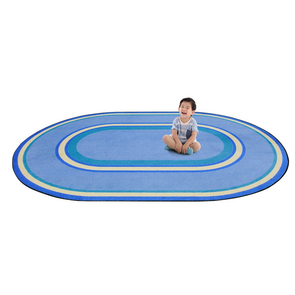 Kid Essentials Ripples 7'8" x 10'9" Oval Area Rug in Color Boy Blue