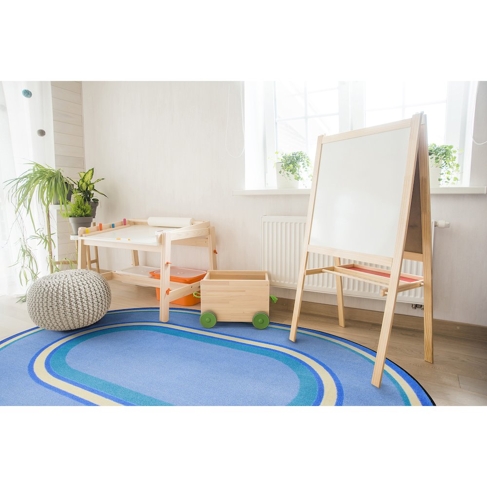 Kid Essentials Ripples 7'8" x 10'9" Oval Area Rug in Color Boy Blue