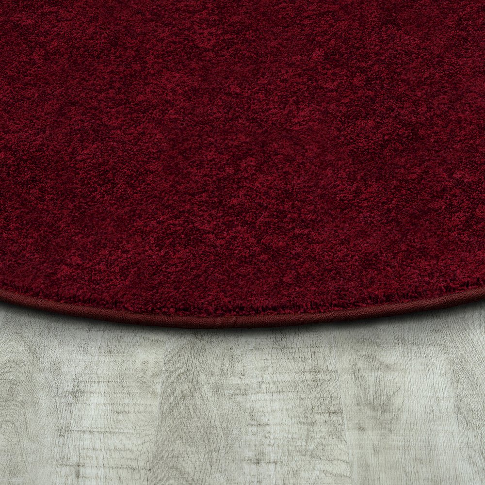 Kid Essentials Endurance 6' x 9' Oval Area Rug in Color Burgundy