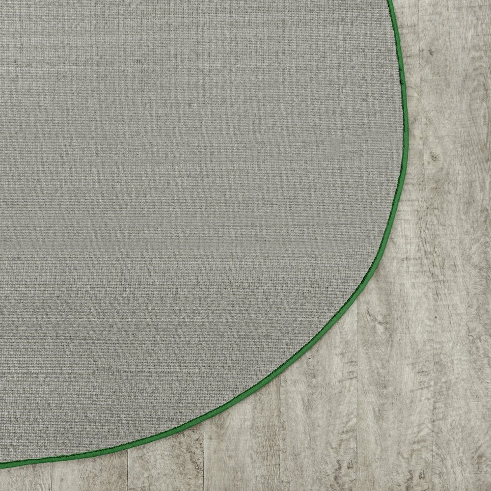 Kid Essentials Just Kidding 6' x 9' Oval Area Rug in Color Grass Green