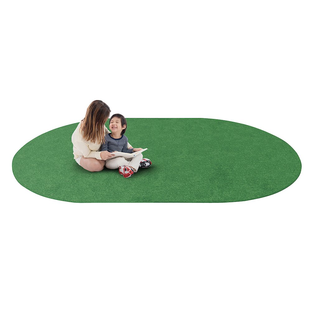 Kid Essentials Just Kidding 6' x 9' Oval Area Rug in Color Grass Green