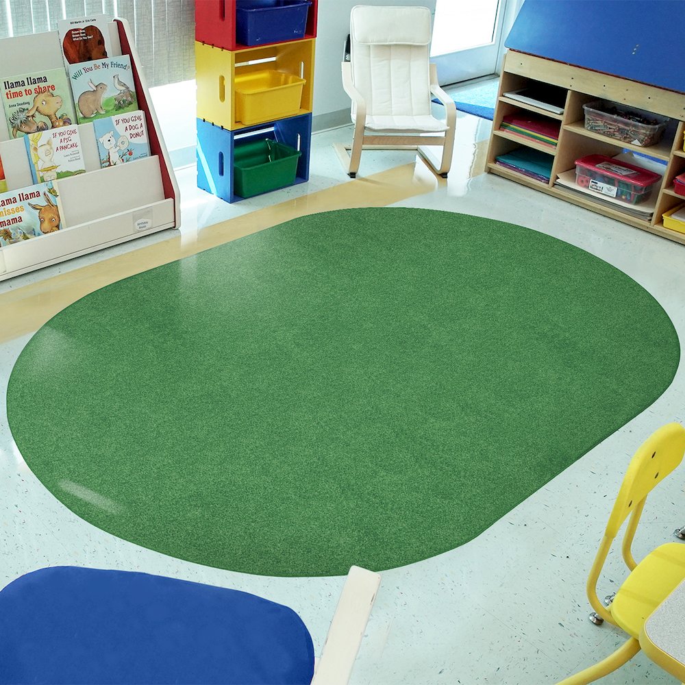 Kid Essentials Just Kidding 6' x 9' Oval Area Rug in Color Grass Green