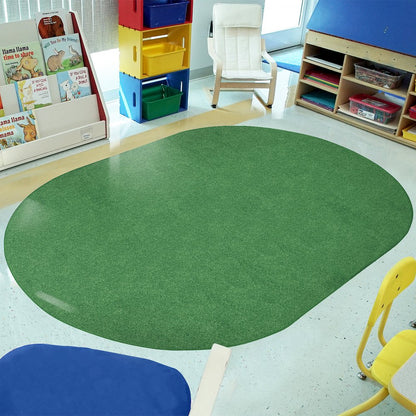 Kid Essentials Just Kidding 6' x 9' Oval Area Rug in Color Grass Green