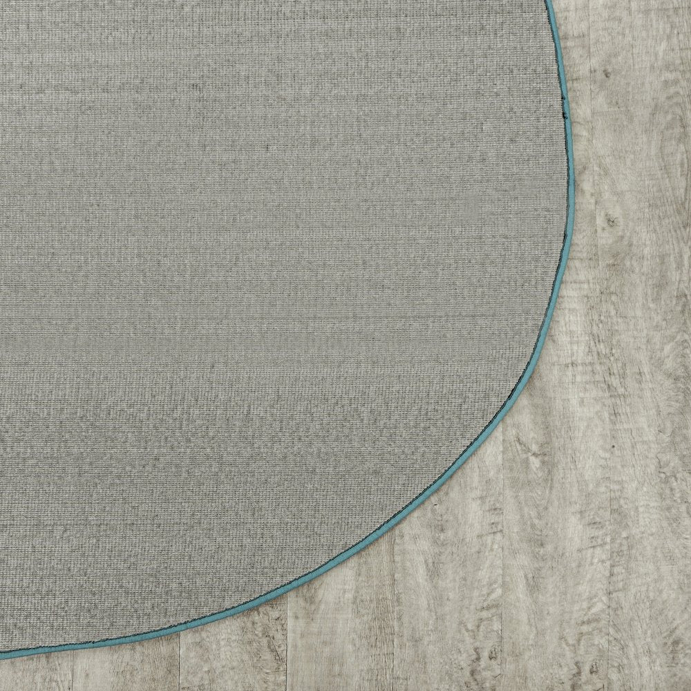 Kid Essentials Just Kidding 6' x 9' Oval Area Rug in Color Seafoam