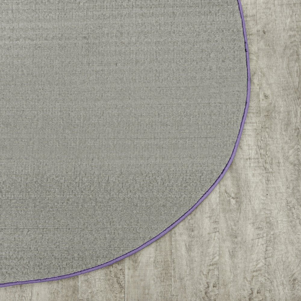 Kid Essentials Just Kidding 6' x 9' Oval Area Rug in Color Very Violet