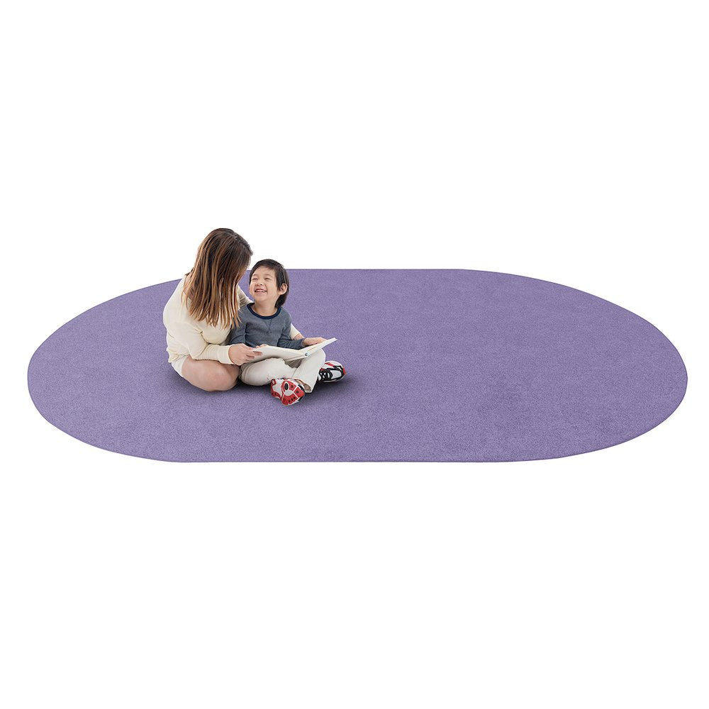 Kid Essentials Just Kidding 6' x 9' Oval Area Rug in Color Very Violet