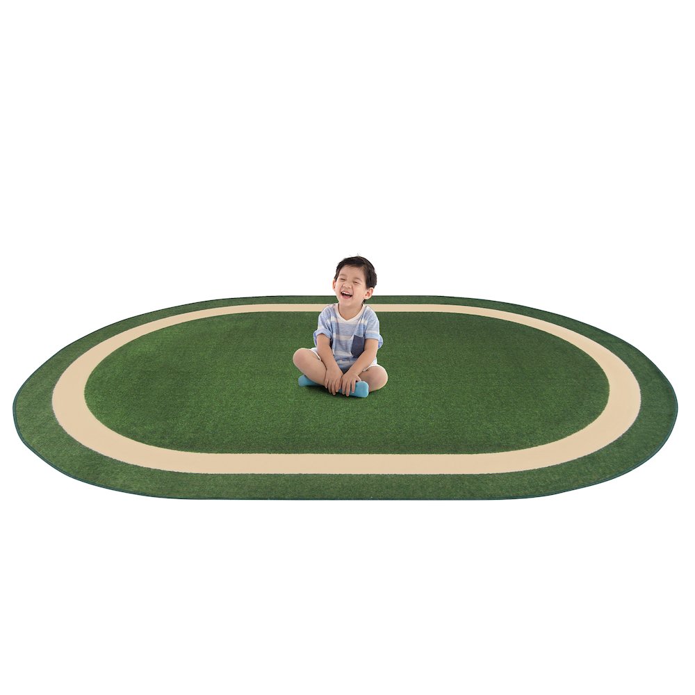 Kid Essentials Portrait 5'4" x 7'8" Oval Area Rug in Color Greenfield