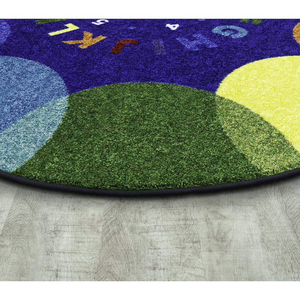 Take A Seat 5'4" x 7'8" Oval Area Rug in Color Multi