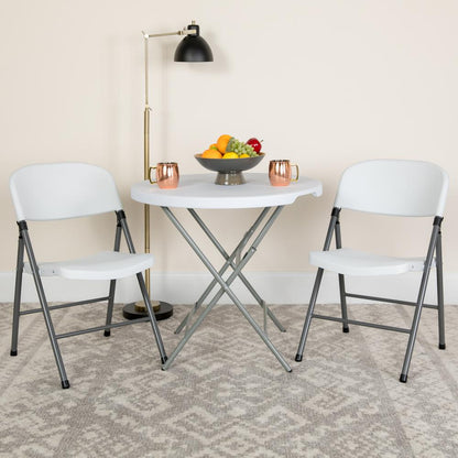330 lb. Capacity Granite White Plastic Folding Chair with Charcoal Frame