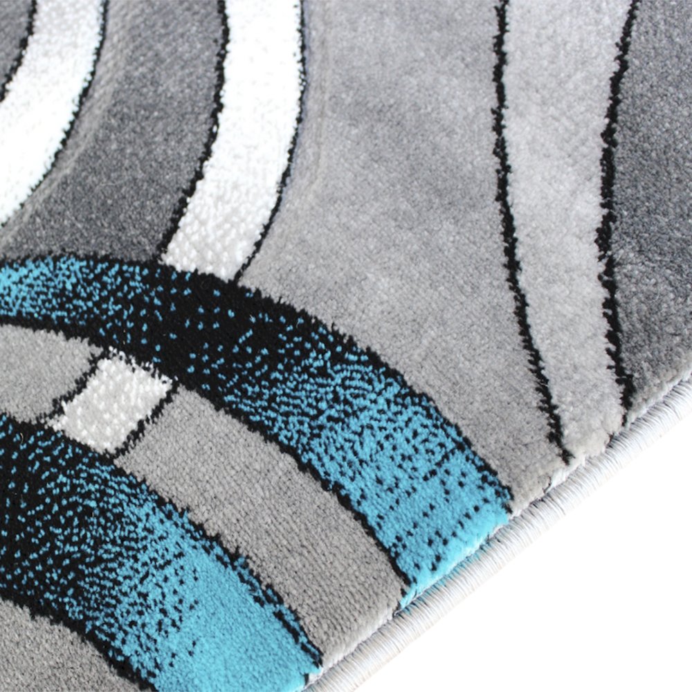 5' x 7' Turquoise Swirl Olefin Area Rug with Jute Backing