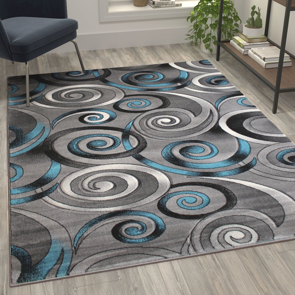 5' x 7' Turquoise Swirl Olefin Area Rug with Jute Backing