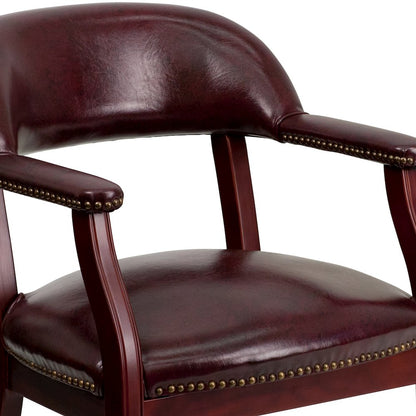 Oxblood Vinyl Luxurious Conference Chair with Accent Nail Trim and Casters