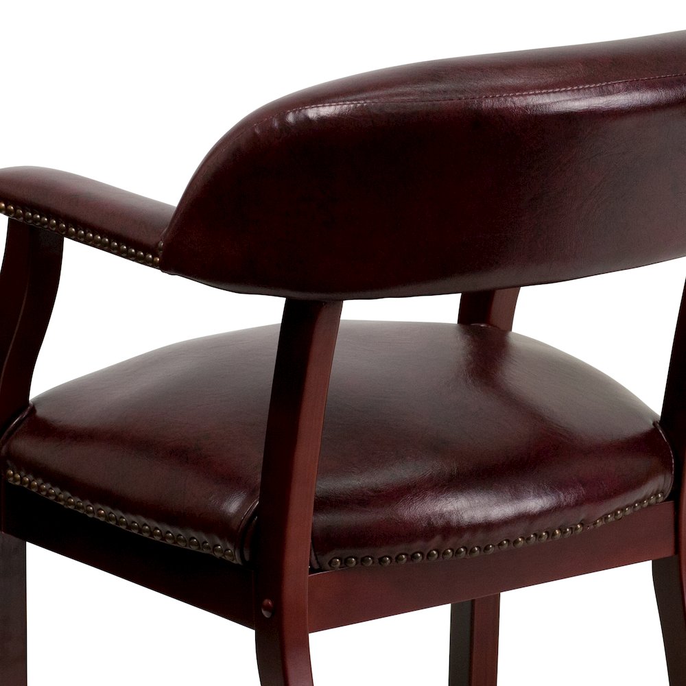 Oxblood Vinyl Luxurious Conference Chair with Accent Nail Trim