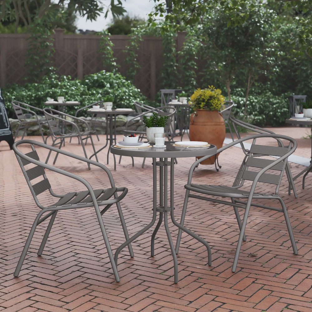 23.75'' Round Glass Top Metal Table with 2 Silver Aluminum Slat Stack Chairs