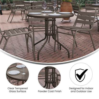 Lila 31.5'' Round Glass Top Metal Table with 4 Bronze Aluminum Slat Stack Chairs