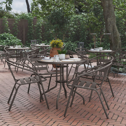 Lila 31.5'' Round Glass Top Metal Table with 4 Bronze Aluminum Slat Stack Chairs