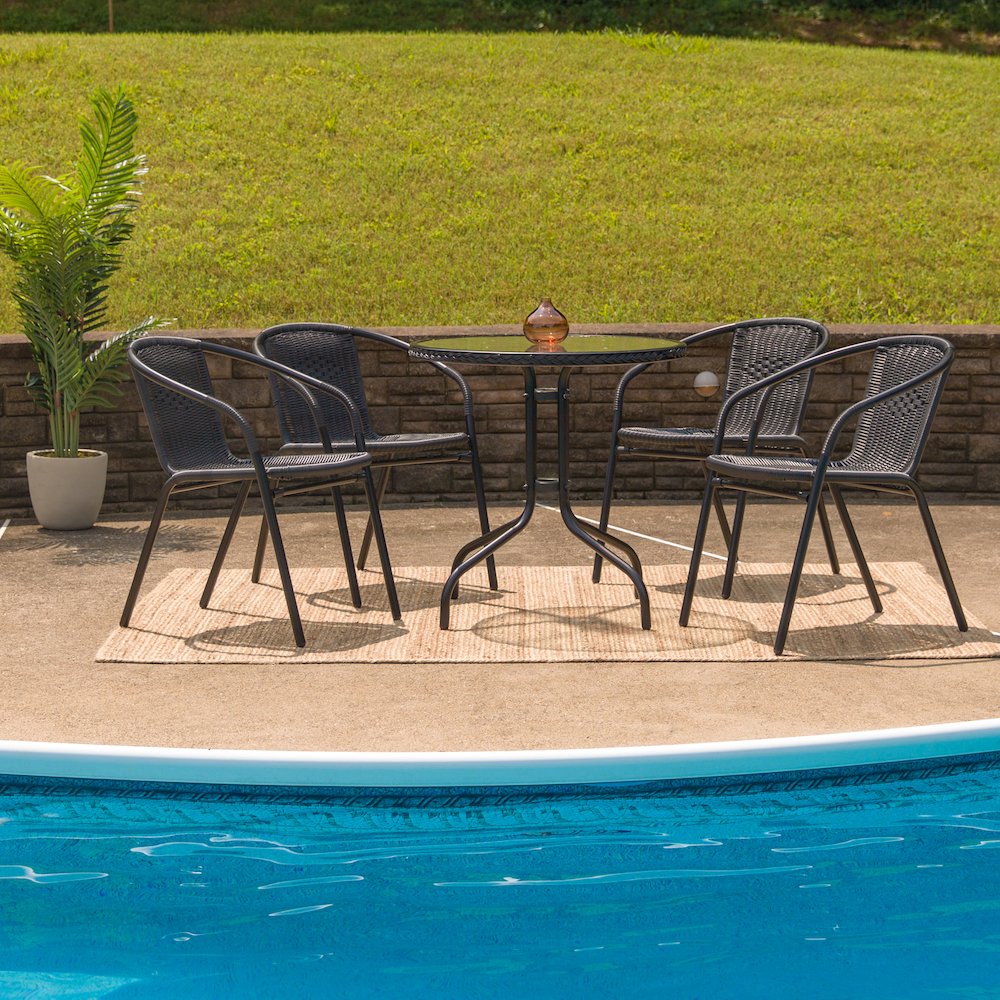 28'' Glass Metal Table with Black Rattan Edging and 4 Black Rattan Stack Chairs