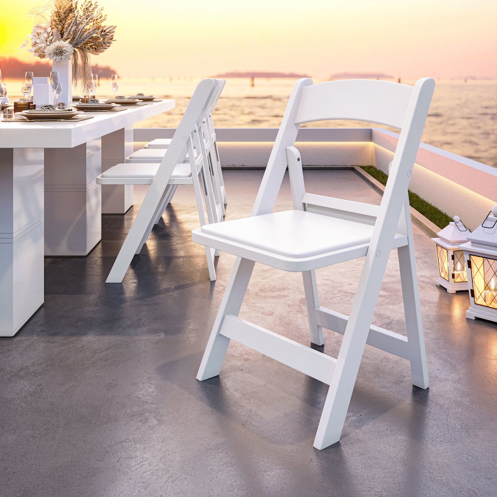 4-Pack White Resin Folding Chairs with Padded Seat