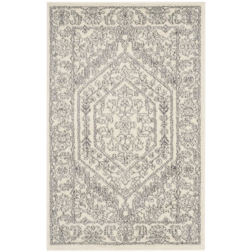 Ivory and Silver Area Rug with Power Loomed Polypropylene Pile for Accent Spaces