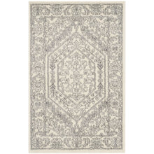 Ivory and Silver Area Rug with Power Loomed Polypropylene Pile for Accent Spaces