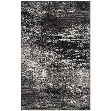 Gray and Black Area Rug with Power Loomed Polypropylene Pile for Accent Spaces