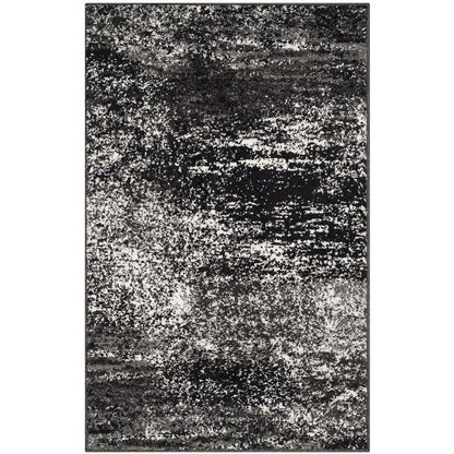 Gray and Black Area Rug with Power Loomed Polypropylene Pile for Accent Spaces