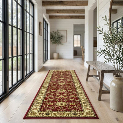 Red and ivory area rug with power loomed polypropylene pile, runner size