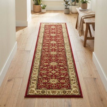 Red and ivory area rug with power loomed polypropylene pile, runner size