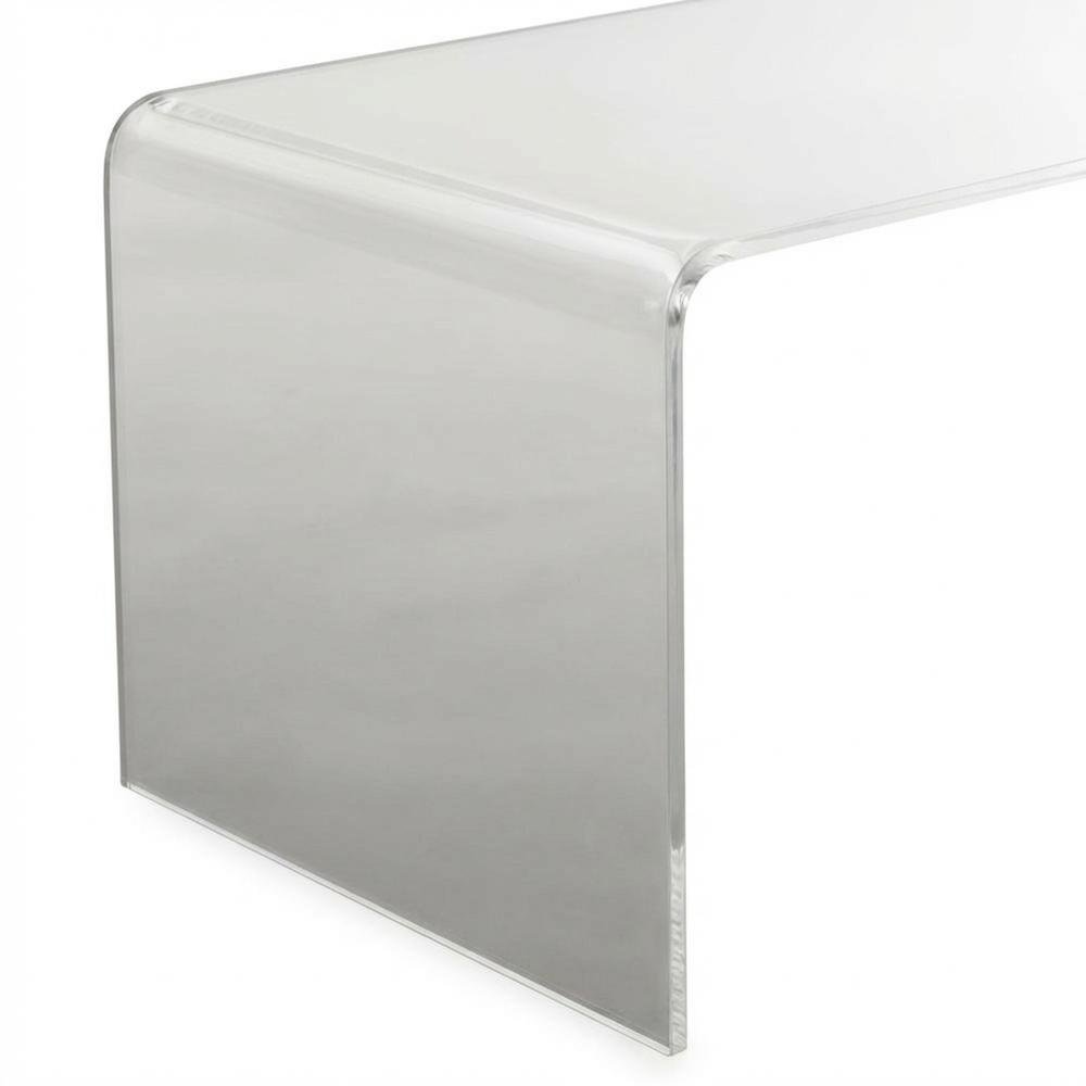 Clear acrylic coffee table with sleek design and lightweight build