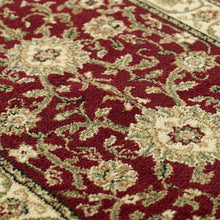 Red and ivory area rug with power loomed polypropylene pile, runner size