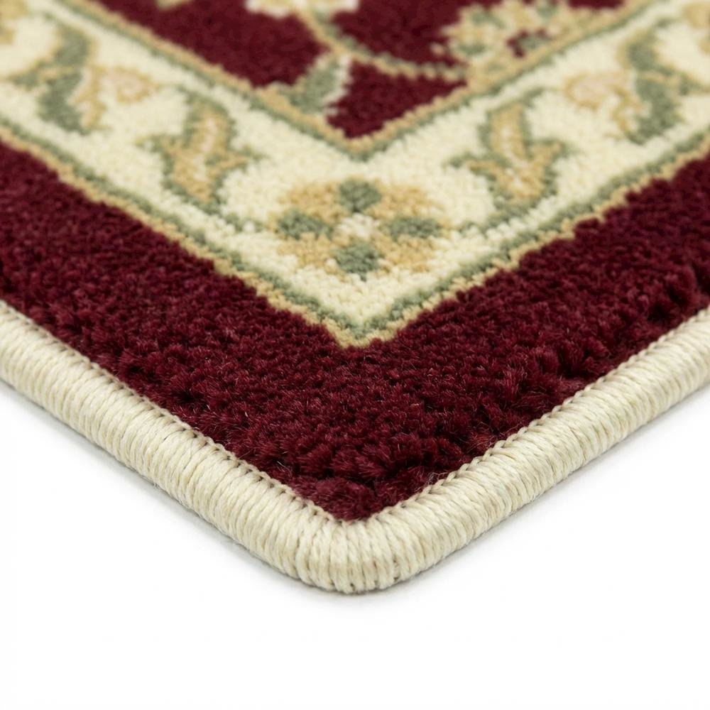 Red and ivory area rug with power loomed polypropylene pile, runner size