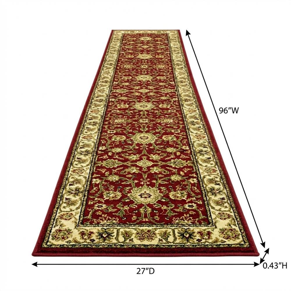 Red and ivory area rug with power loomed polypropylene pile, runner size
