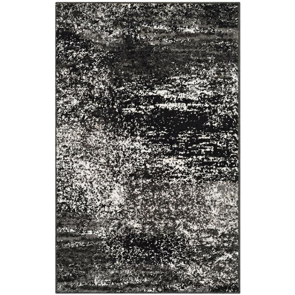 Gray and Black Area Rug with Power Loomed Polypropylene Pile for Accent Spaces