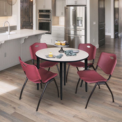 36 in. Round Breakroom Table- Maple Top, Black Tapered Legs