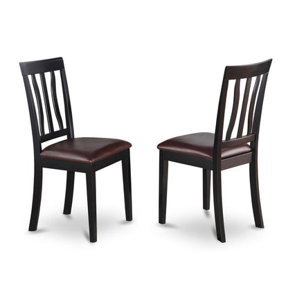 5  Pc  set  with  a  Round  Dinette  Table  and  4  Leather  Dinette  Chairs  in  Black