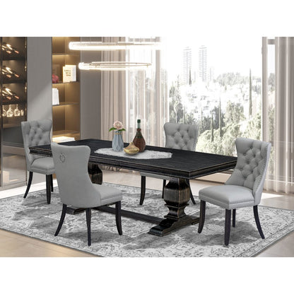 5 piece dining set includes a wooden table and 4 Faux Leather parson chairs