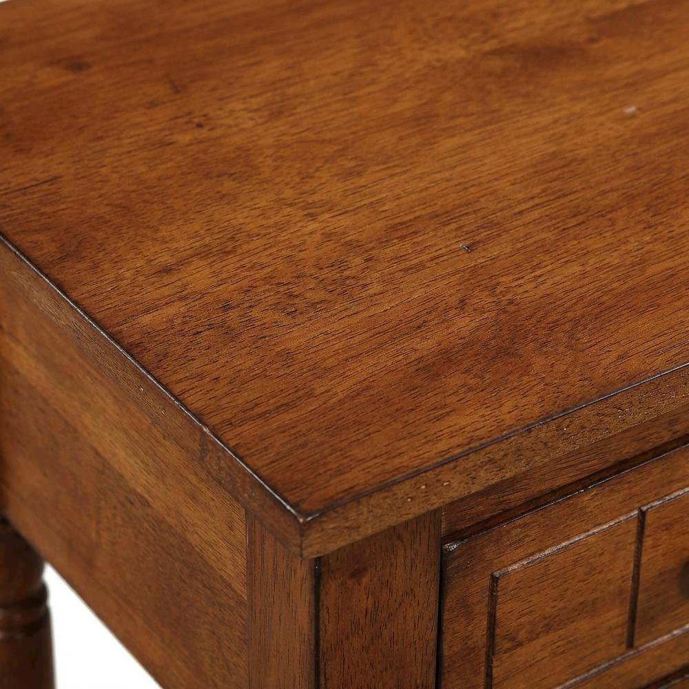 Traditional-style accent table with open shelf and compact design