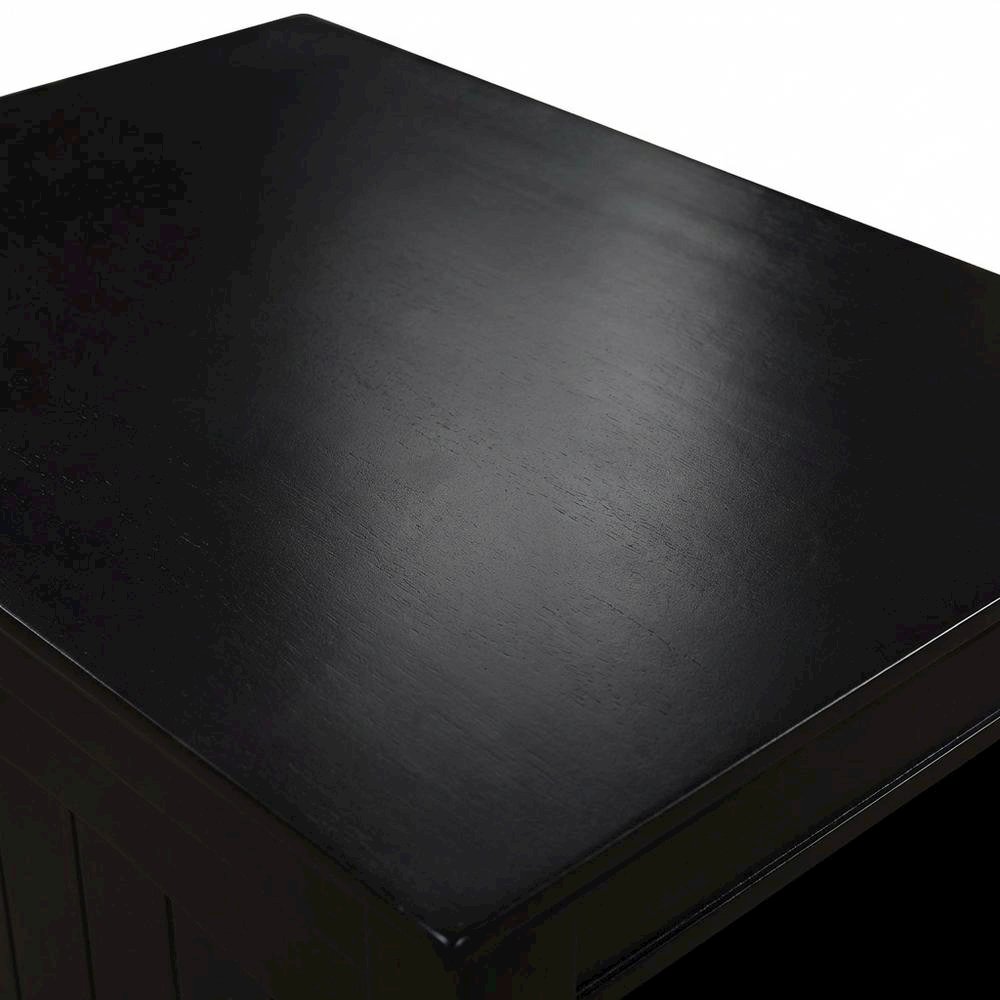 Black end table with built-in charging station and spacious shelf