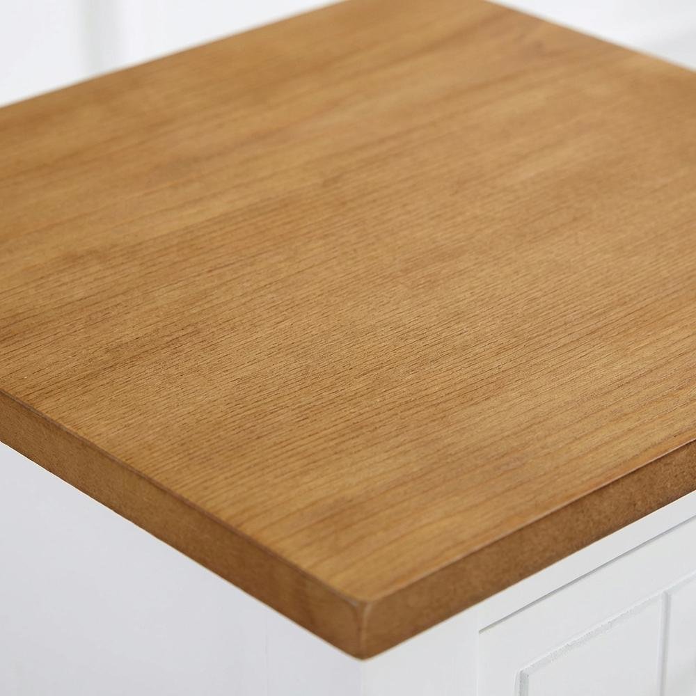 Traditional-style accent table with drawer and shelf for versatile living spaces