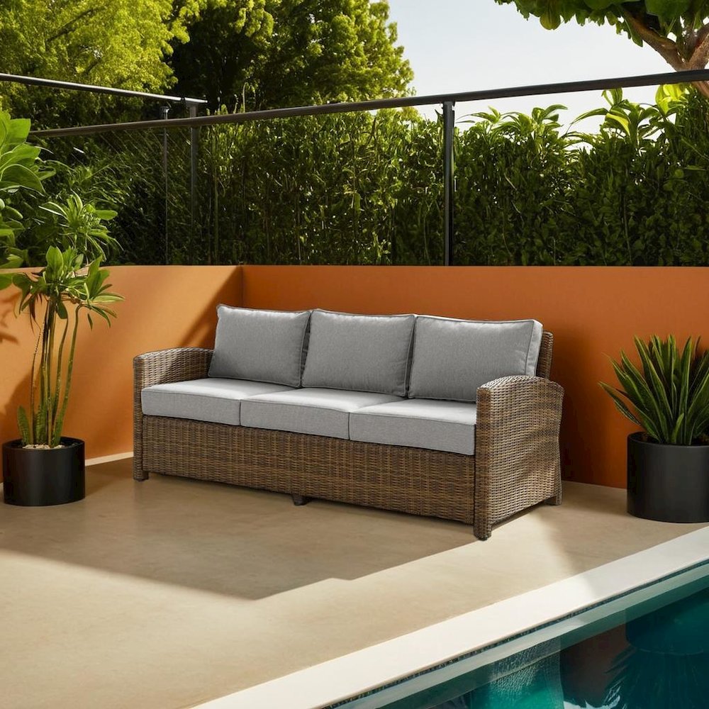 Elegant Gray Wicker Outdoor Sofa with Weather-Resistant Cushion Covers